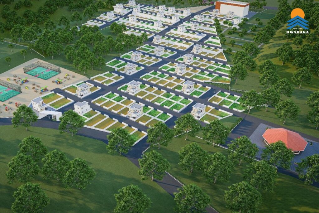 Aerial view of a planned senior living township, Ujjeevana, with villas, roads, and green spaces.