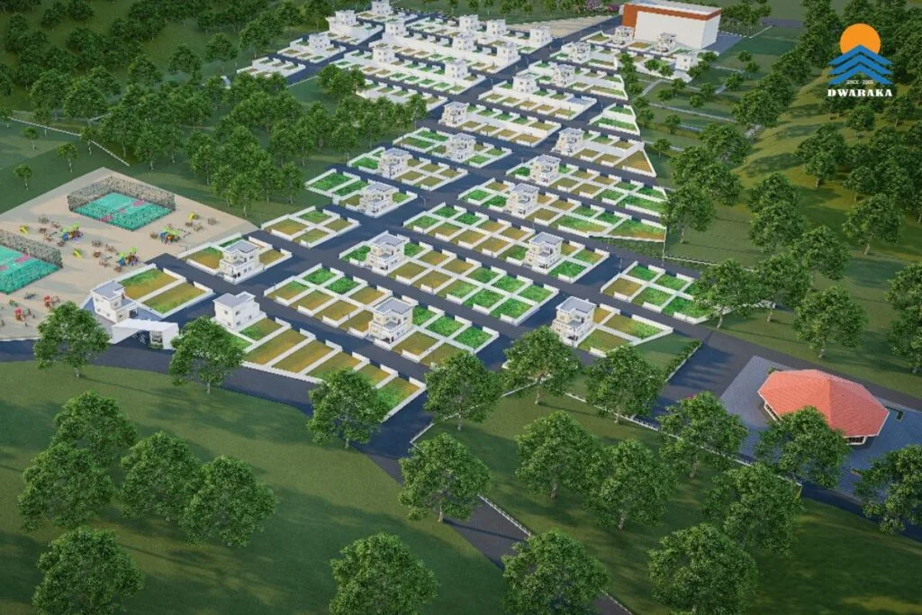 Aerial view of a planned senior living township, Ujjeevana, with villas, roads, and green spaces.